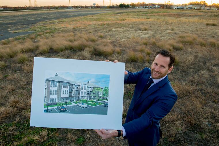 Tom Juliano, president of Delco Development of Willingboro, stands at the site at Routes 130 and 73 in Pennsauken. Various plans over the last decade to redevelop the site of the Pennsauken Mart have come to nothing.