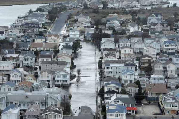 Portions of Ocean City, NJ still have flooded streets. ( CLEM MURRAY / Staff Photographer )