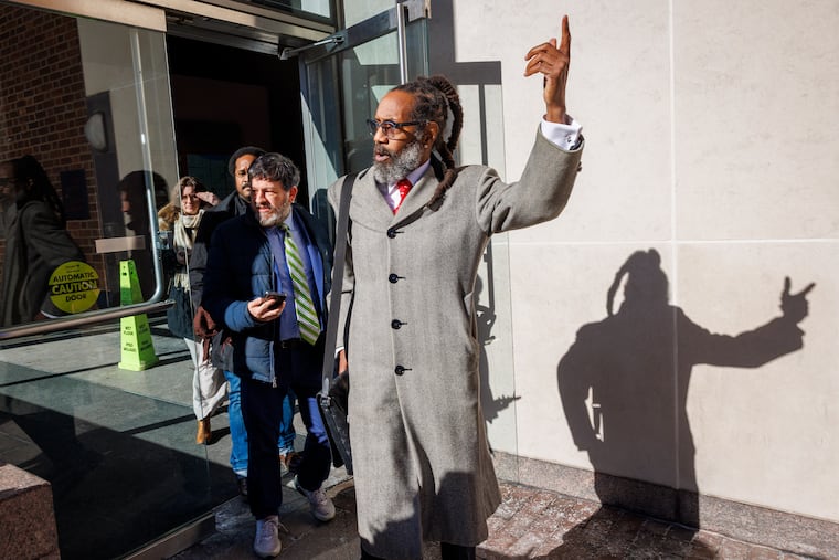 Michael Coard, attorney and founding member of Avenging the Ancestors Coalition, exits the James A. Byrne United States Courthouse during a break in the hearing as a federal judge weighs the Trump administration's removal of slavery exhibits from the President's House.