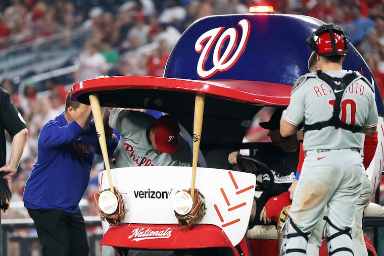Phillies pitcher Jhoan Duran gets carted off of the field during the ninth inning of a baseball game against the Washington Nationals, Friday, Aug. 15, 2025, in Washington.