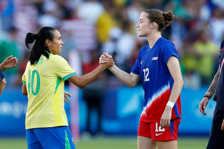 The U.S.' Tierna Davidson (right) and Brazil's Marta exchanging pleasantries before the 2024 Olympics gold medal game, one of the many great contests between the teams over the years.