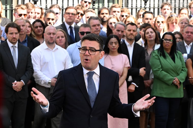 Britain's new Prime Minister Andy Burnham speaks to staff and media at 10 Downing Street in London, Monday, July 20, 2026.