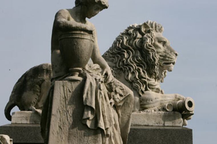 The grave marker of Robert Patterson is a lion at Laurel Hill Cemetery. The lion represents courage and determination of the soul whose tomb he guards. In the foreground is the grave marker of General Francis Engle Patterson. ( Charles Fox / Staff Photographer