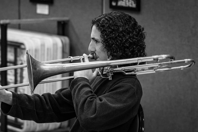 A trombone student in a classroom at the Philadelphia Clef Club.