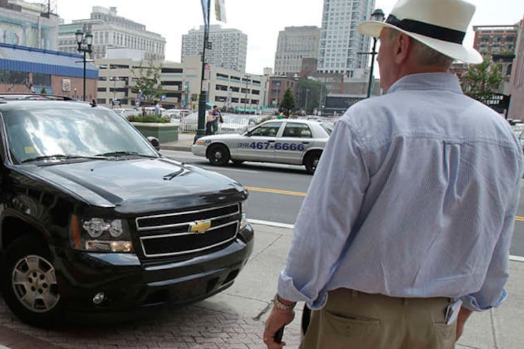 Ride-share services such as Uber are transforming the taxi business in Philadelphia.(Akira Suwa / file)