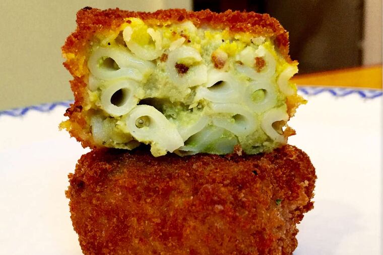 Fried mac n' peas bites.