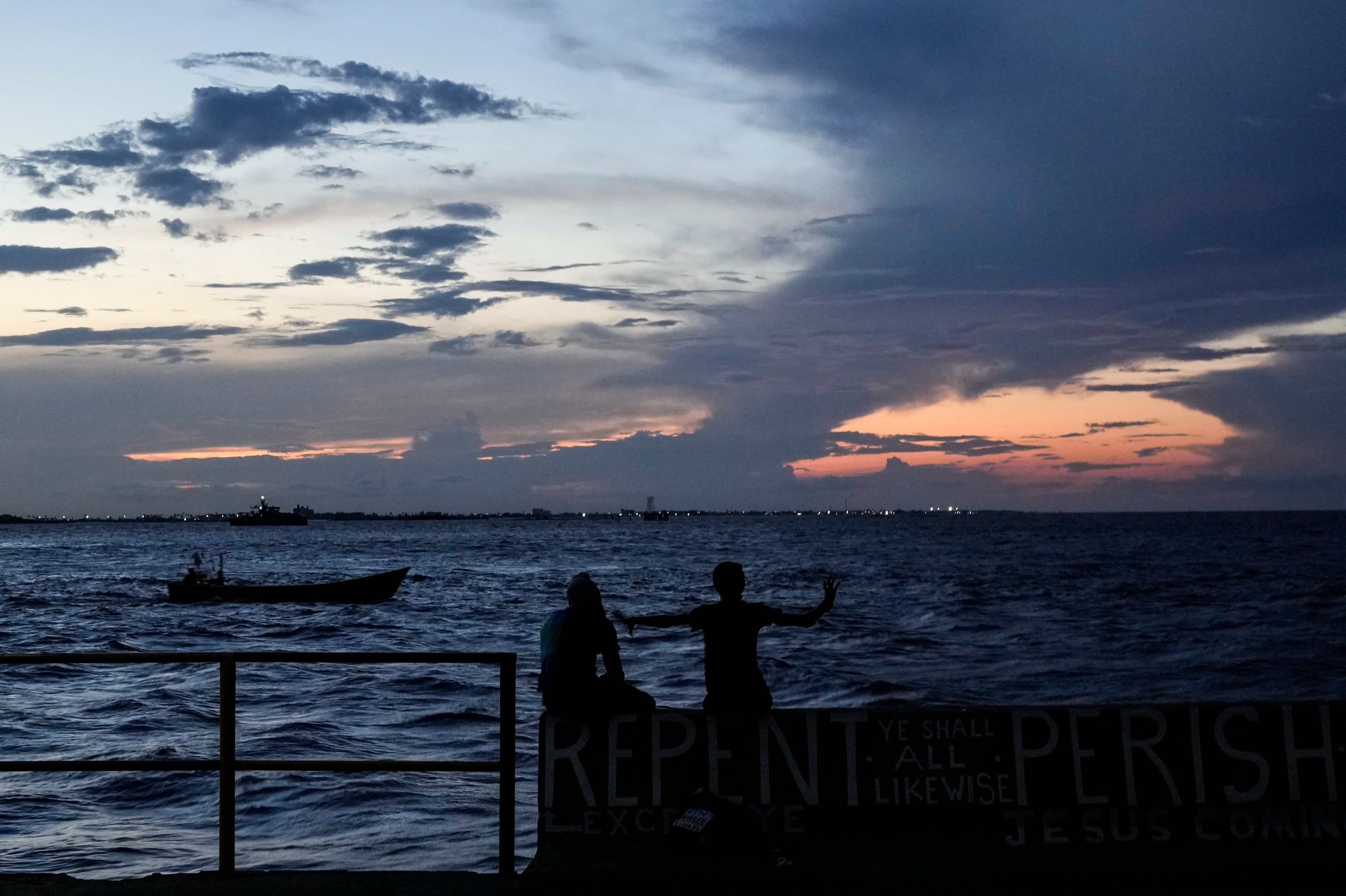 A ferry carrying 133 people capsizes off Guyana's coast, leaving dozens missing