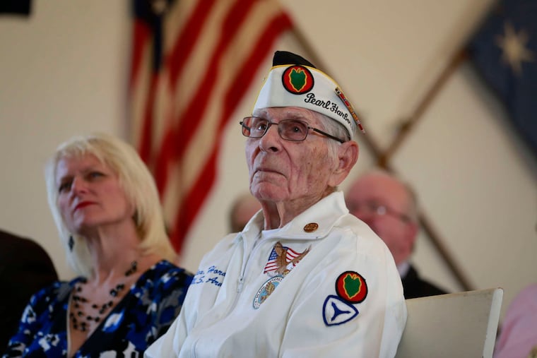 Pearl Harbor survivor Alex Horanzy, 93, of Northeast Philadelphia, participates in a memorial service at the Valley Forge Chapel of the Four Fathers.