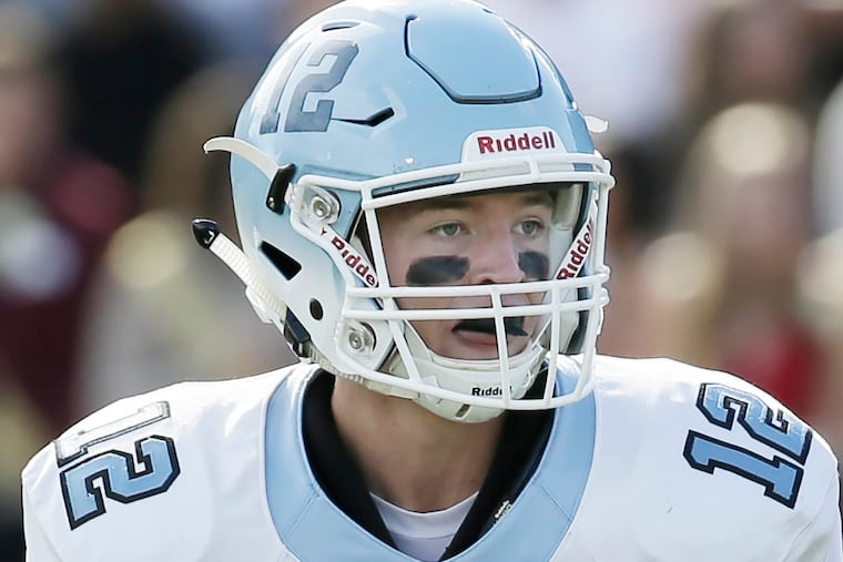 Highland quarterback Brian Cooey leads the Tartans vs. school-district rival Triton.