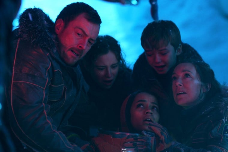 From left: Toby Stephens, Mina Sundwall, Taylor Russell, Max Jenkins, Molly Parker, in a scene from Netflix's "Lost in Space"