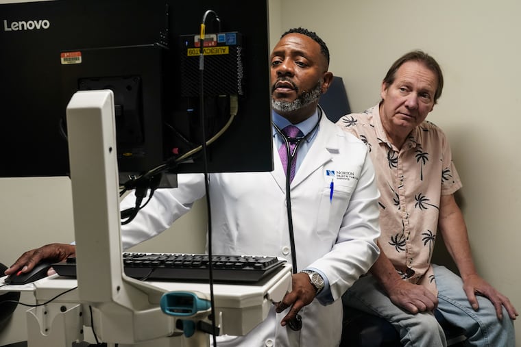 Cardiologist Kelly McCants sees patient Tim McIntosh, 57, in Louisville. McIntosh says his parents both had heart issues and his father died at 39. Men should be monitored for cardiovascular disease risks earlier in life, a new study says. MUST CREDIT: Washington Post photo by Jahi Chikwendiu