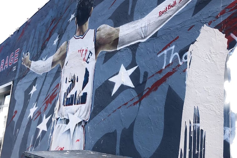 Someone threw white paint over Matisse Thybulle's signature on the mural of him on the side of Garage Fishtown over the weekend.