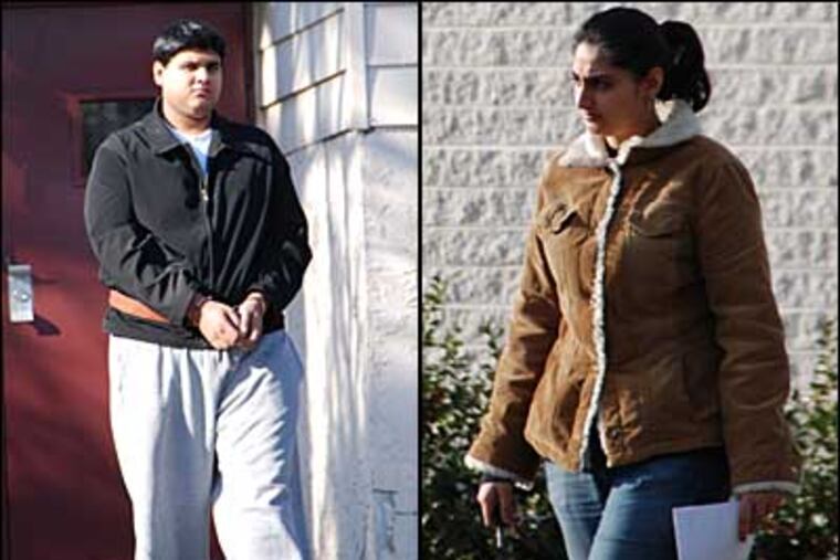 Parth Arunkumar Ingle (left) and his sister, Avenee, have been charged with computer crimes connected to alleged indiscretions of their father, found murdered in January. (Dave Schlott / For the Daily News)