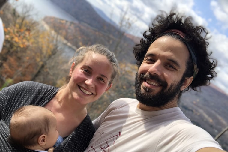 Hannah and Dan, with baby Rani.