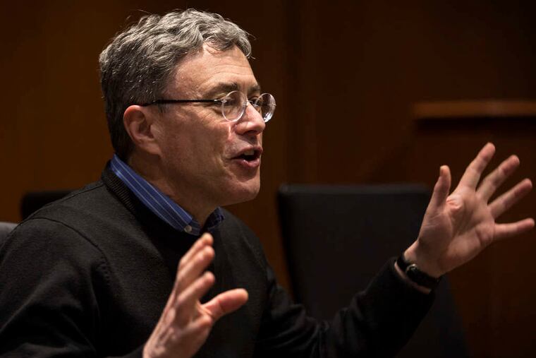 Michael Baime , 59, director of the Penn Program for Mindfulness, leads the group in Radnor. LAURENCE KESTERSON