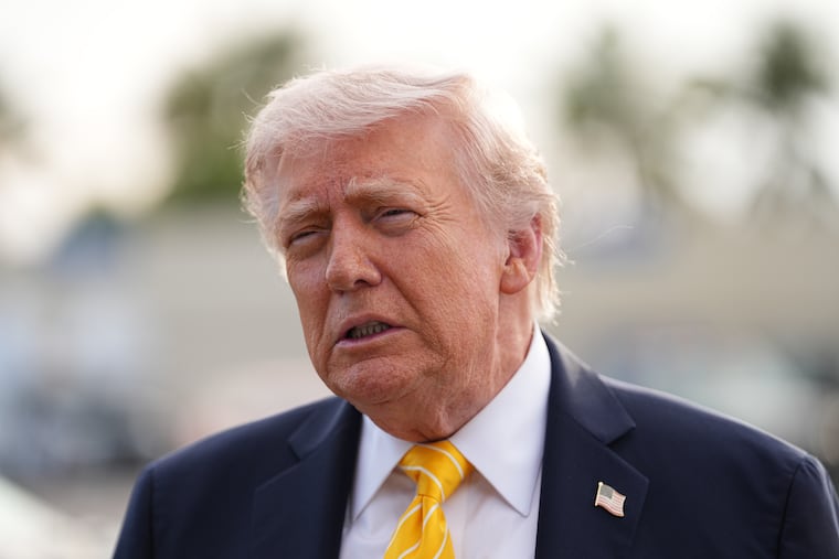 President Donald Trump talks to reporters before he boards Air Force One at Palm Beach International Airport in West Palm Beach, Fla., Saturday May 2, 2026, en route to Miami.
