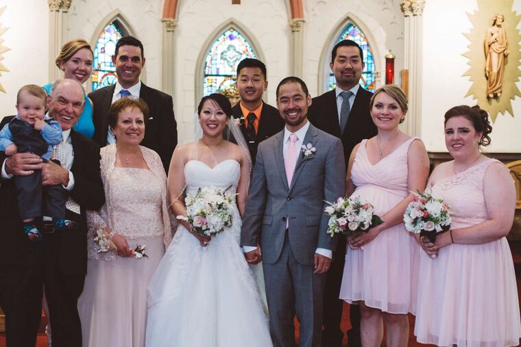 Elisabeth McPeak and Arthur Sato with their families.