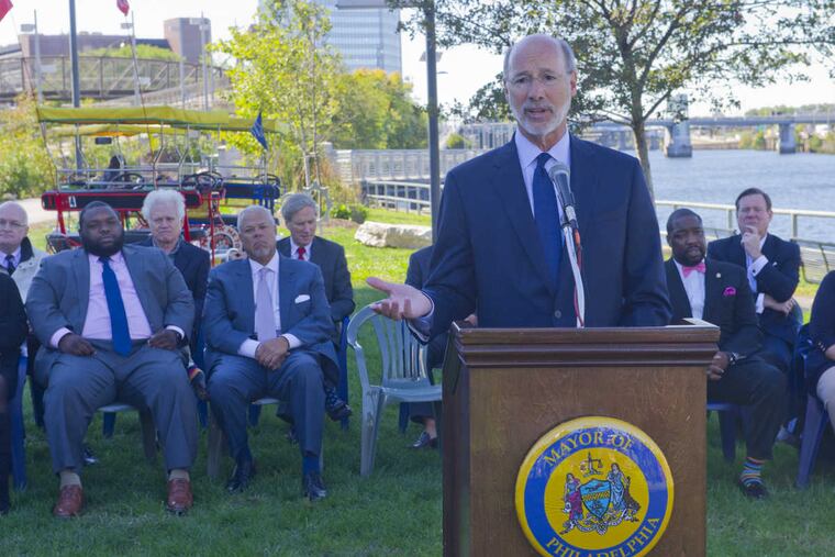 Pennsylvania Governor Tom Wolf speaks during announcement of more work and funding for the Schuylkill River Trail along the trail near 25th and Locust in Philadelphia Monday afternoon.