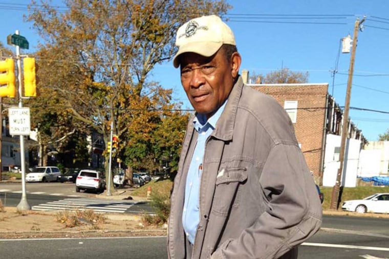 Ellis Gilliom, who lives nearby, wants the water department to fix the leaking hydrant on 61st and Lindbergh. (HELEN UBINAS / Daily News staff)