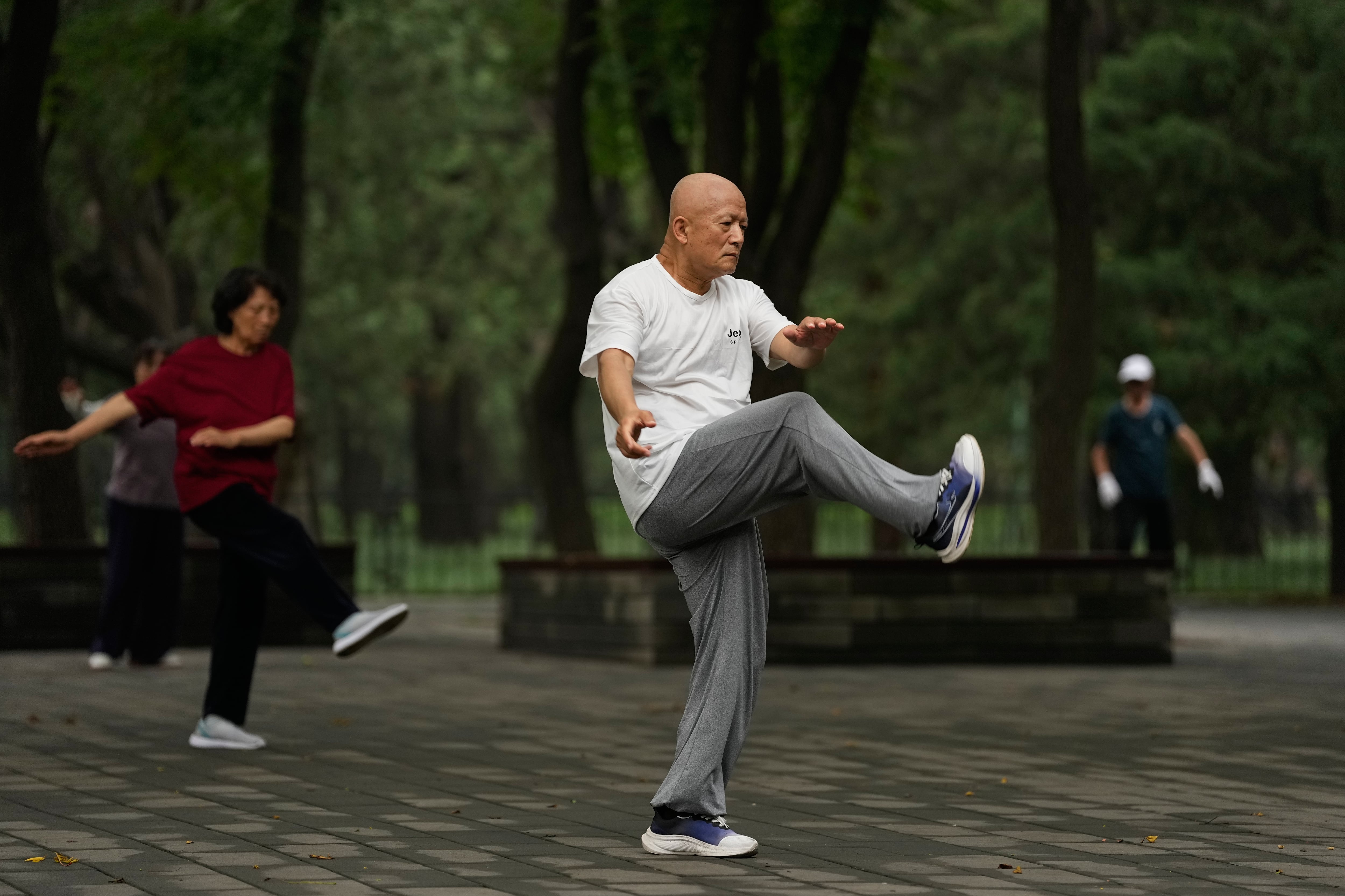 Tai chi practitioners seek balance and well-being in fast-paced Beijing