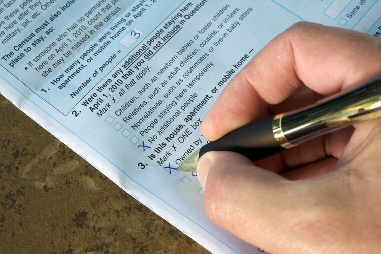 A person answers the 2010 United States Census 2010.