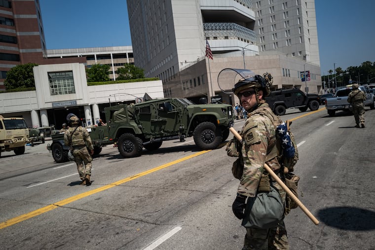 National Guard troops and law enforcement officers in Los Angeles in June.