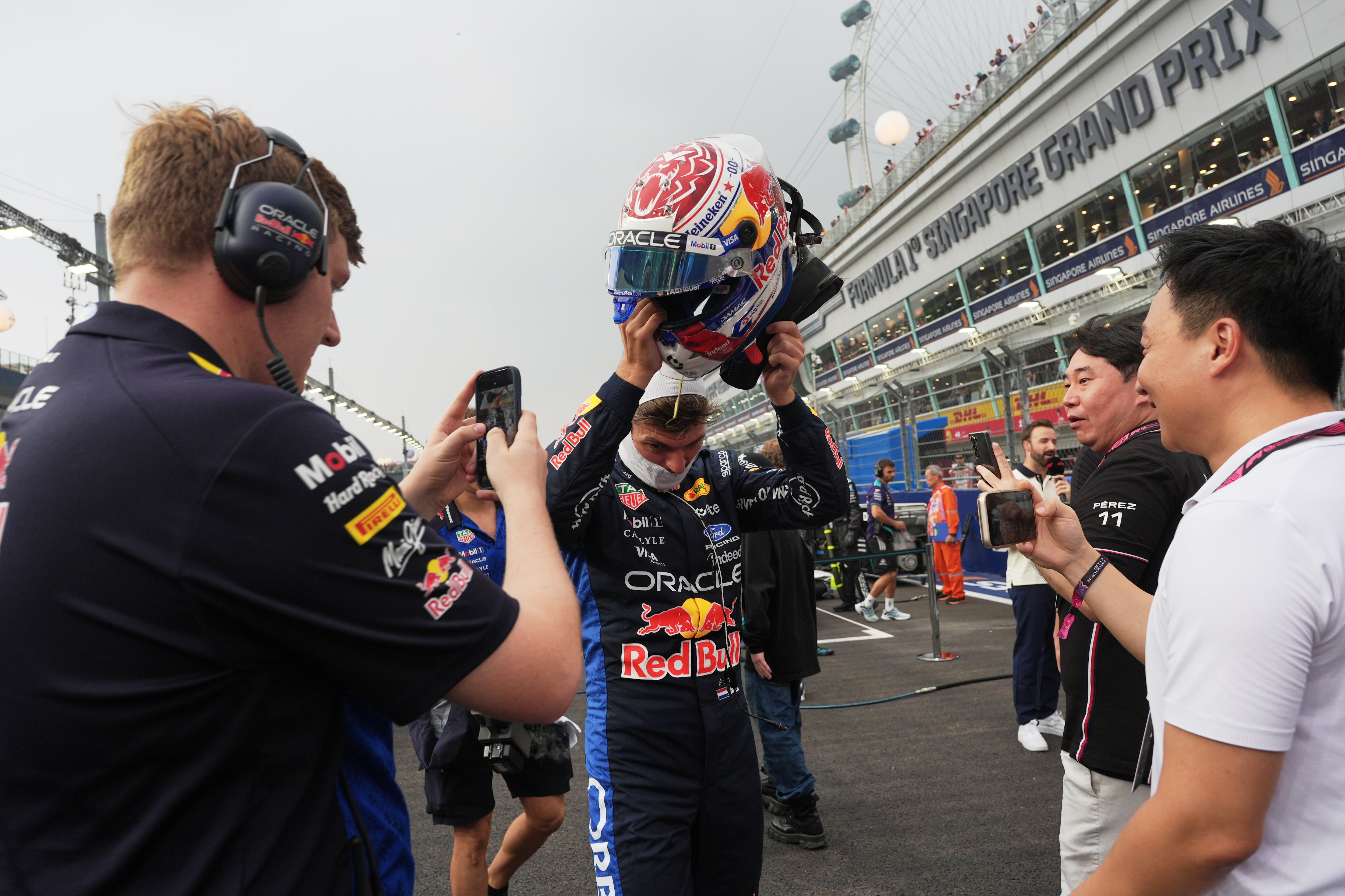 Singapore F1 sprint race start delayed after heavy rain