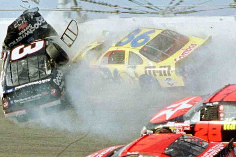 Dale Earnhardt's No. 3 Chevrolet slams into a wall after being hit by Ken Schrader (36).The deadly crash in the 2001 Daytona 500 has spurred the efforts to keep drivers safe.