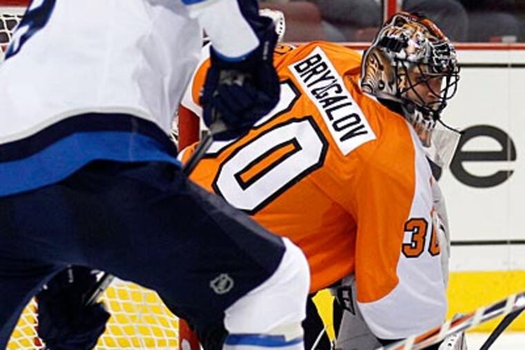Ilya Bryzgalov allowed four goals and picked up the loss against the Jets on Thursday night. (Yong Kim/Staff Photographer)