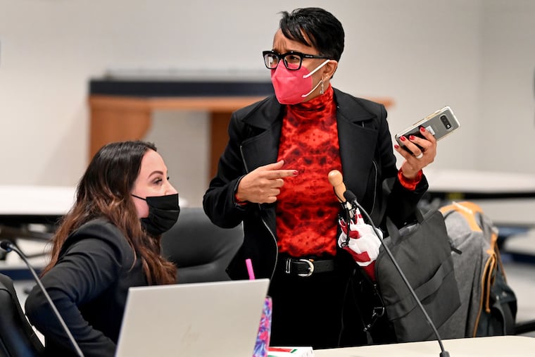 Northern Burlington County Regional School Board vice president Angela Reading (left) and member Kerri Tillett (right) talk following their meeting Feb. 22, 2022. Tillett was overwhelmingly elected to her seat but is now fighting to keep her position after three county residents signed a petition to recall her.