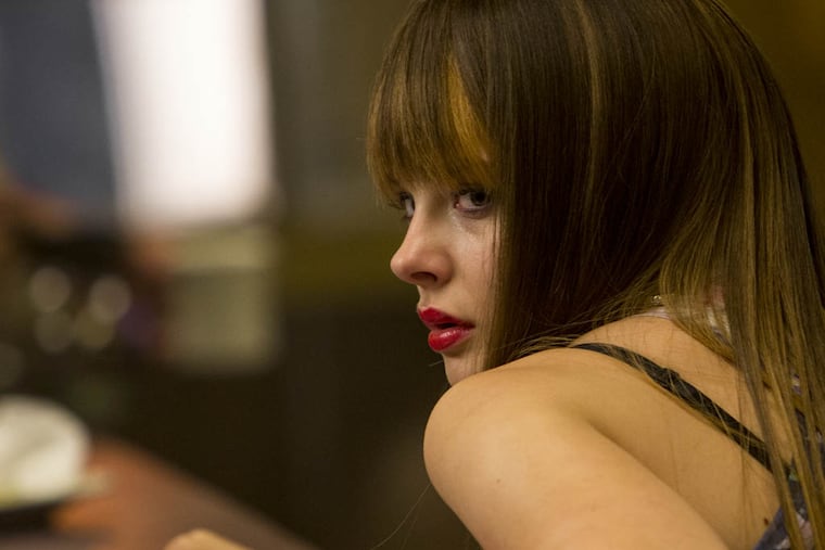 In this image released by Columbia Pictures, Chloe Grace Moretz appears in a scene from "The Equalizer." (AP Photo/Sony, Columbia Pictures, Scott Garfield)