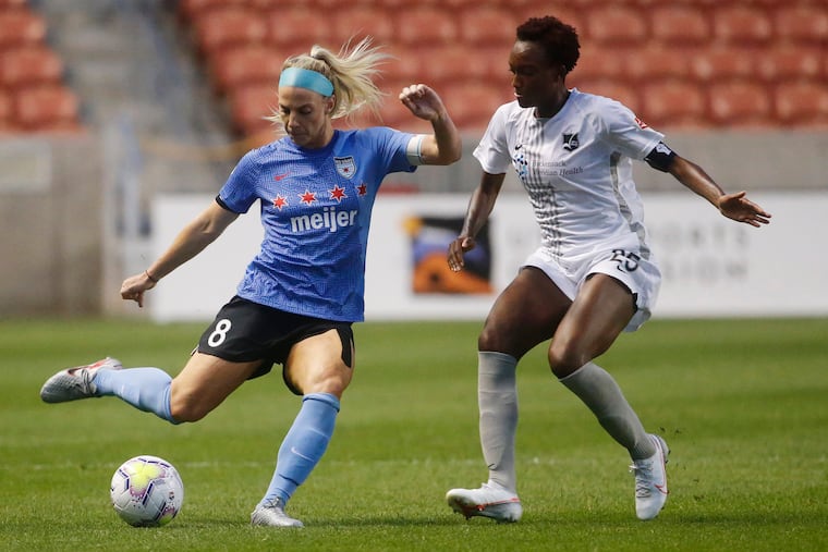 Chicago Red Stars star Julie Ertz (left) on the ball during the semifinal against Sky Blue FC.