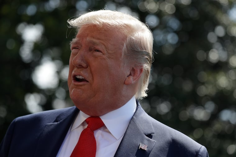 President Donald Trump talks to reporters on the South Lawn of the White House before departing for his Bedminster, N.J. golf club, Friday, July 5, 2019, in Washington.