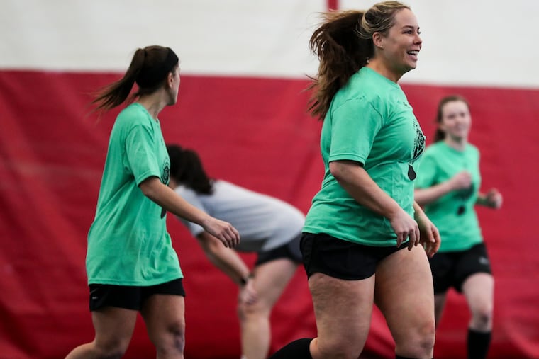 Jackie Gizara, from the Lady Bandits, smiles after scoring a goal in the final round of the Women’s Empowerment Cup held at Temple’s Student Training and Recreation Center on Sunday.