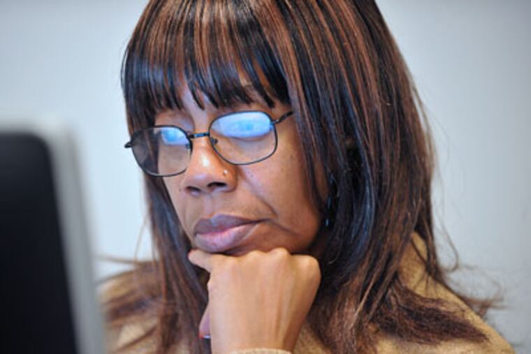 At Parent University, Regina Lowry is hard at work during a Basic Computer class. The class is held at the district headquarters in Philadelphia. (Sharon Gekoski-Kimmel / Staff Photographer)