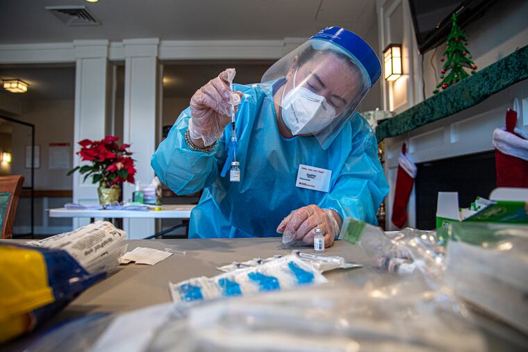 Pharmacist, Nadine M. Mackey, prepares a COVID-19 vaccine shots at the the Power Back Rehabilitation, in Phoenixville, P.A. Monday, December 28, 2020.