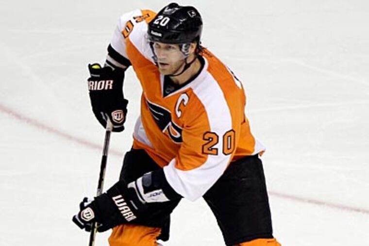 Flyers captain Chris Pronger has concussion-like symptoms and will be out indefinitely. (Matt Slocum/AP)