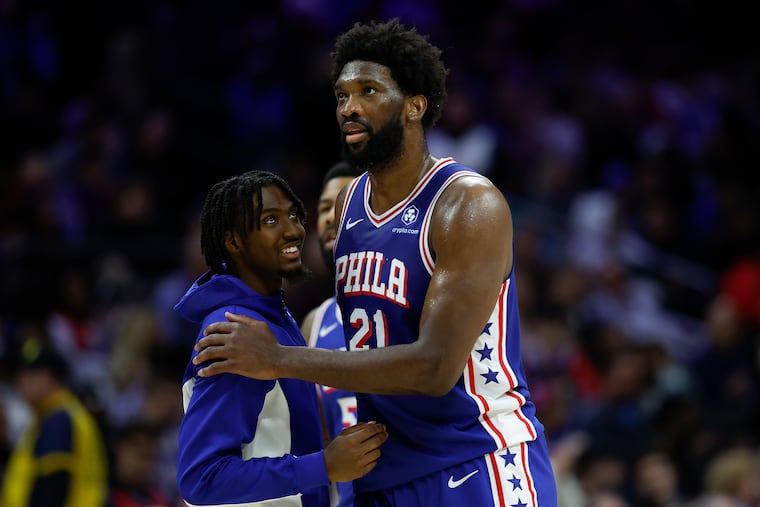 Sixers center Joel Embiid and teammate guard Tyrese Maxey against the Washington Wizards on Monday, November 6, 2023 in Philadelphia.