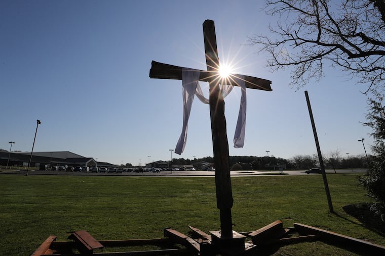 During a fire last month, this cross fell 75 feet from a steeple atop the Fountain of Life Center church in Florence Township, Burlington County. Easter services were held on the Life Center grounds on Sunday.