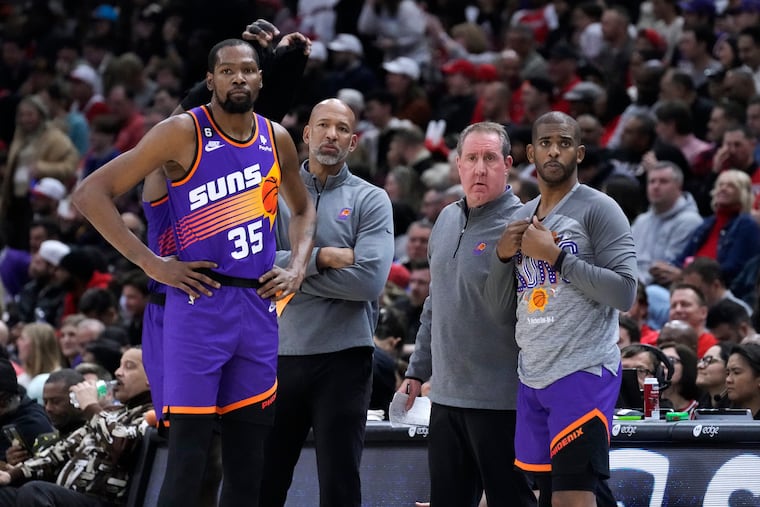 Former Suns assistant coach Bryan Gates (second from right) is now joining the Sixers staff.