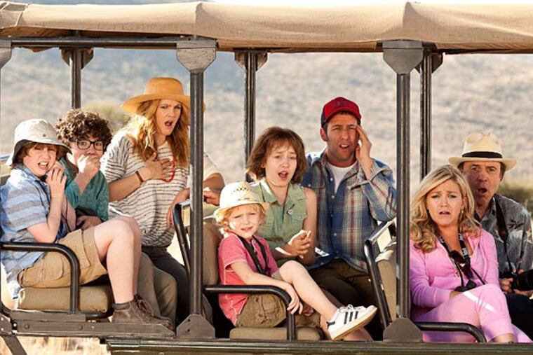 In "Blended," Drew Barrymore as Lauren and Adam Sandler as Jim are single parents who cross paths on an African vacation with their children. (Warner Bros. Pictures)