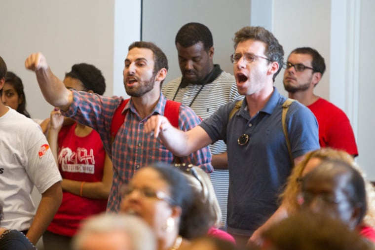 The School Reform Commission met in special session Thursday afternoon to vote on changes to union rules and contract talks as the Dr. Hite's deadline on whether schools will open looms. The open meeting was packed with protesters who heckled Hite and the other members. ( ED HILLE / Staff Photographer )