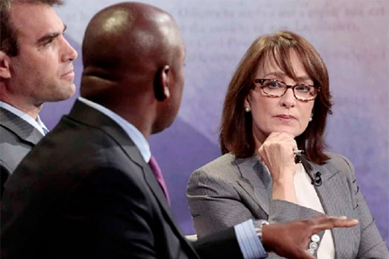Nancy Snyderman, shown participating in a discussion with Richard Buery, front, and Jeff Edmondson in September 2012, has left NBC News as a medical correspondent. (Charles Sykes / NBC)