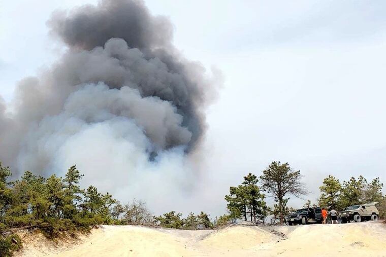 The New Jersey State Police are seeking the public's assistance with identifying two men wanted in connection to the Spring Hill wildfire in Burlington County. Detectives believe that the two men pictured below may have information about the fire that began on March 30 and consumed more than 11,000 acres of forest in Washington and Woodland Townships. Anyone with information is asked to contact Detective Sergeant First Class Shaun Georgeson of Tuckerton Station at 609-296-3132.