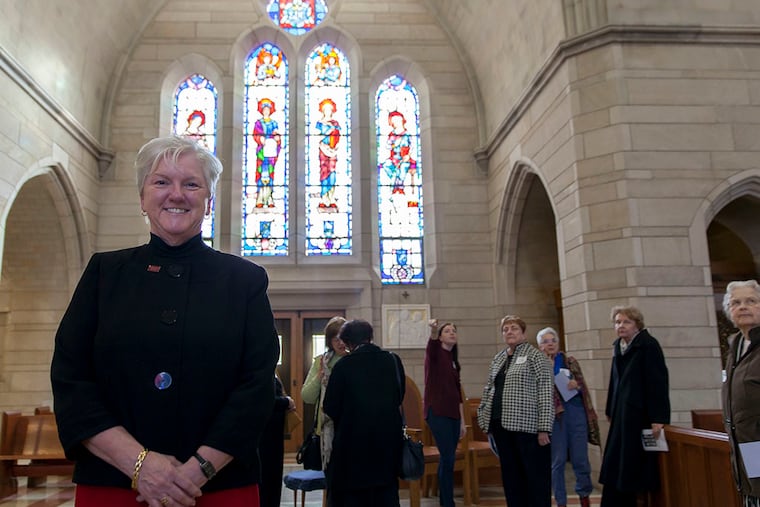 President and alumna of Rosemont College Sharon Latchaw Hirsh Ph.D., during The Chapel of the Immaculate Conception at Rosemont College open house. The chapel is one of only two U.S. chapels with stained glass windows depicting only female saints. (Chanda Jones / Staff Photographer)
