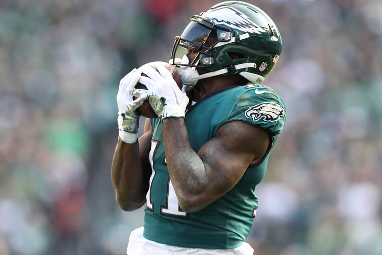 Eagles wide receiver A.J. Brown catches a second-quarter touchdown reception against the Tennessee Titans on Sunday, December 4, 2022 in Philadelphia.