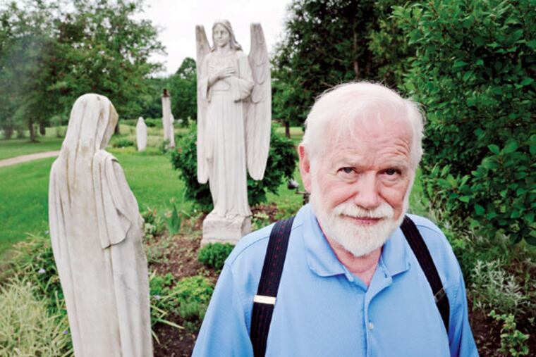 James Cattanea stands by the rosary garden of Our Lady of Fatima Monastery. Cattanea is a longtime deacon at adjacent St. John Neumann Catholic Church, which for years has been staffed by the monks. (CLEM MURRAY / Staff Photographer)