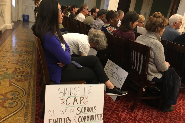 A hearing on the state of Philadelphia's schools drew about 100 people Monday, with parents and advocates calling for increased investment in the district.