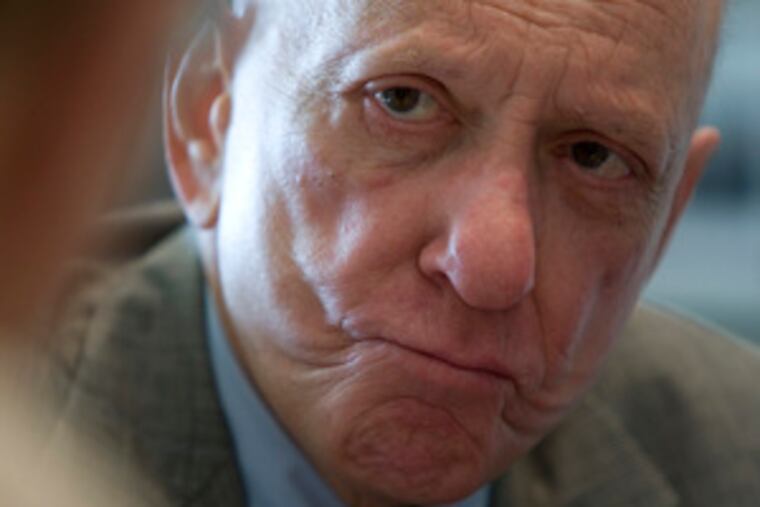 Sen. Arlen Specter talks to reporters on Capitol Hill. He said he was in "good physical shape" following chemotherapy for Hodgkin's disease, but was eager to regrow his hair: "I get letters saying I ought to wear a toupee."