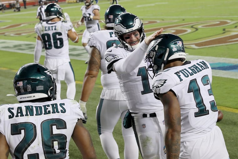 Carson Wentz congratulates Travis Fulgham, after the Eagles finally broke through.